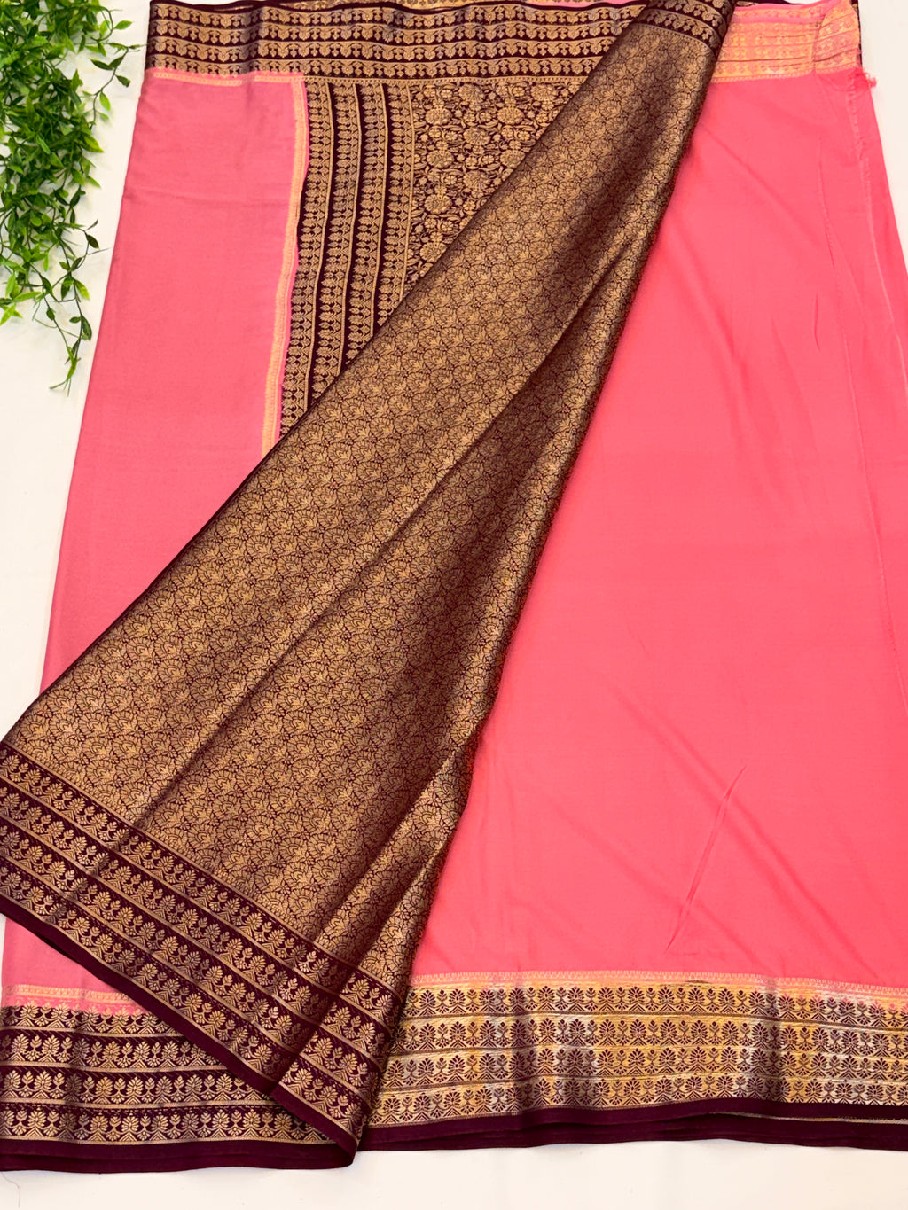 Peach Crepe Silk saree with Maroon Zari Border