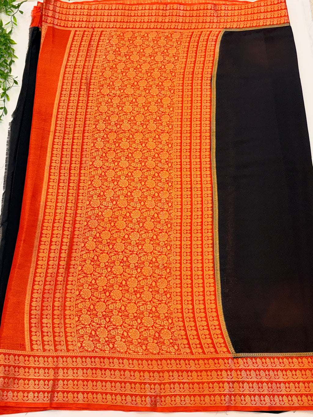 Black Crepe Silk saree with Orange Zari Border