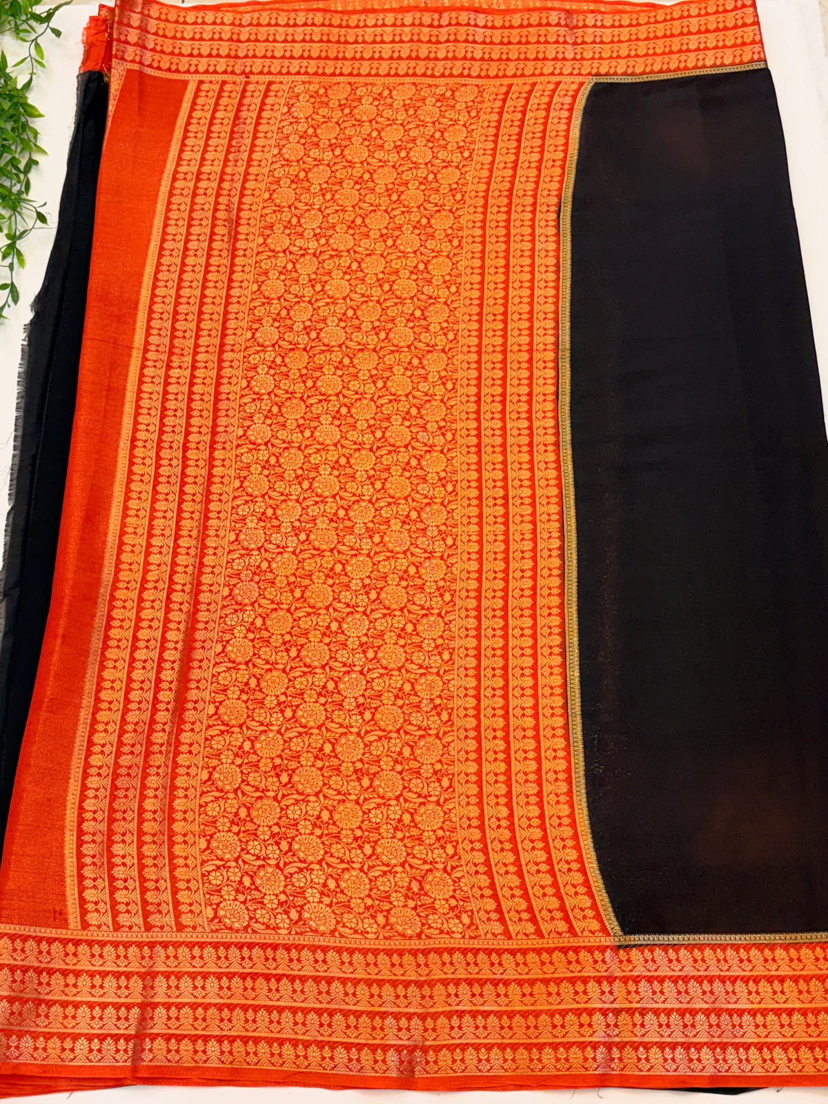 Black Crepe Silk saree with Orange Zari Border