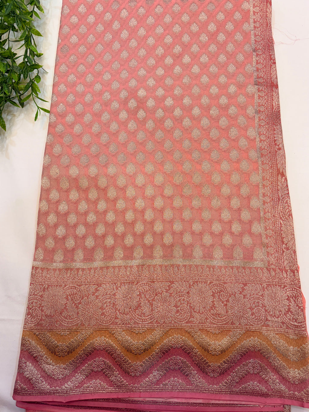 Peach Pink Khaddi Georgette Saree with Silver Buttis