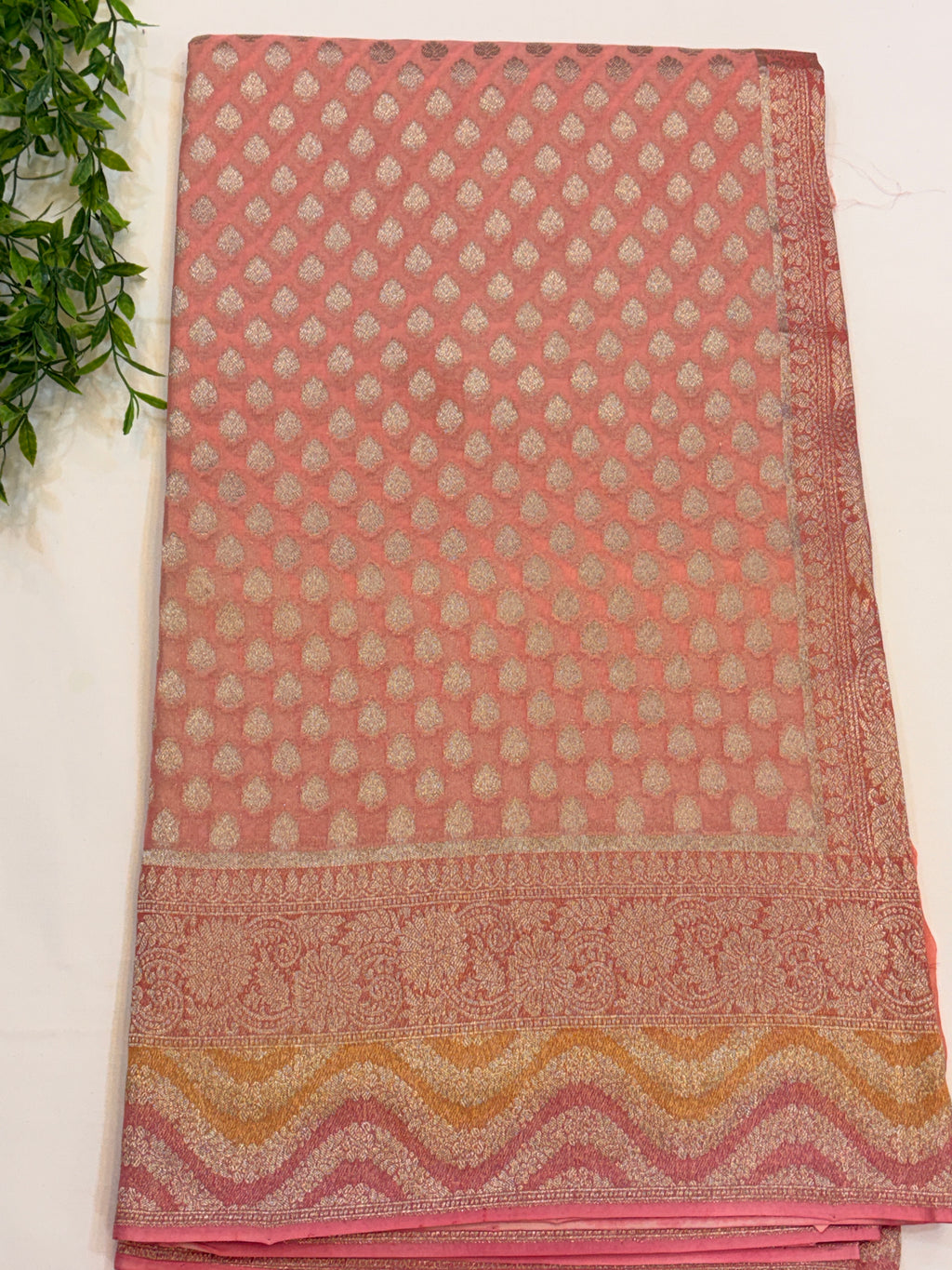 Peach Pink Khaddi Georgette Saree with Silver Buttis