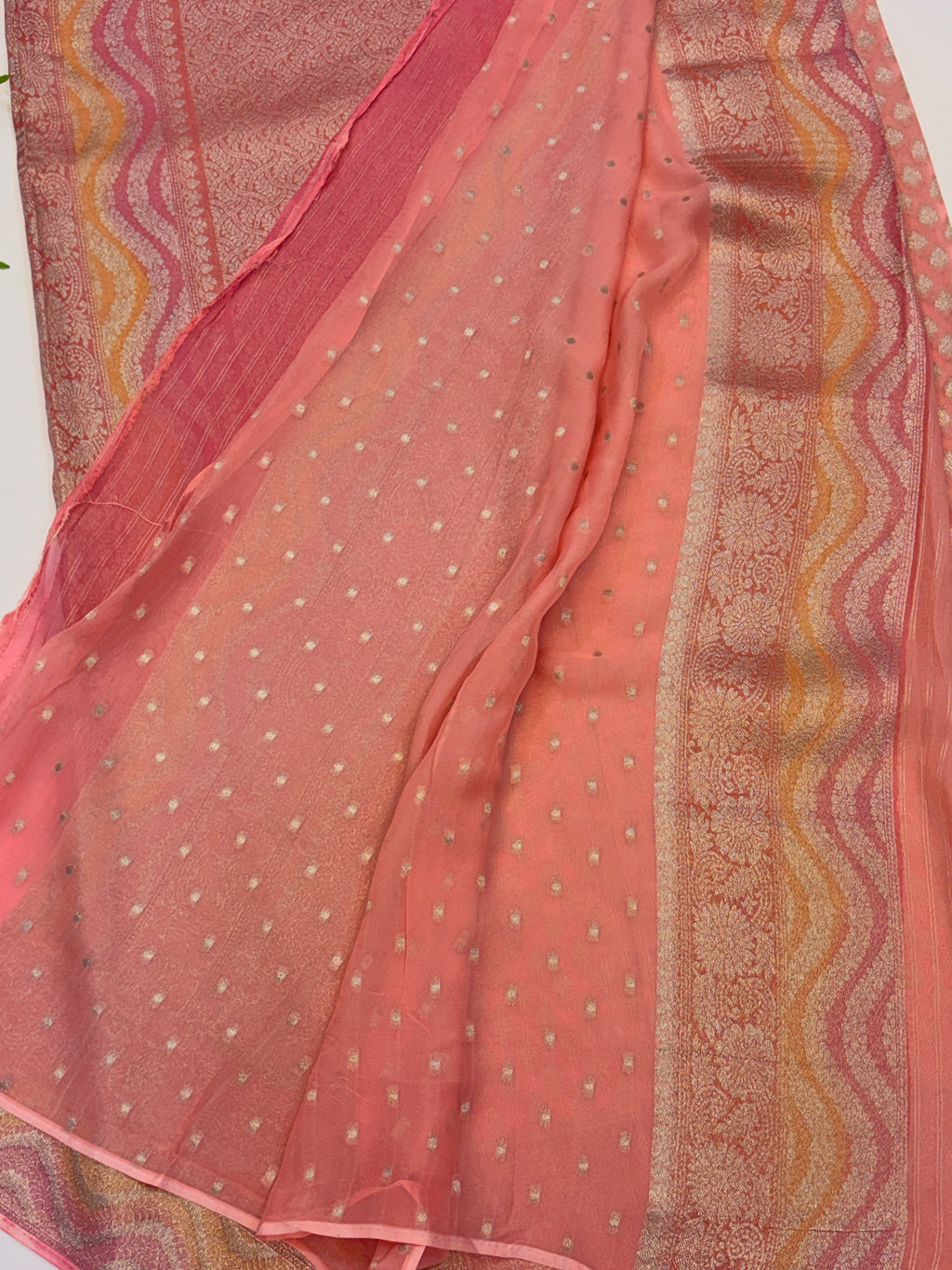 Peach Pink Khaddi Georgette Saree with Silver Buttis