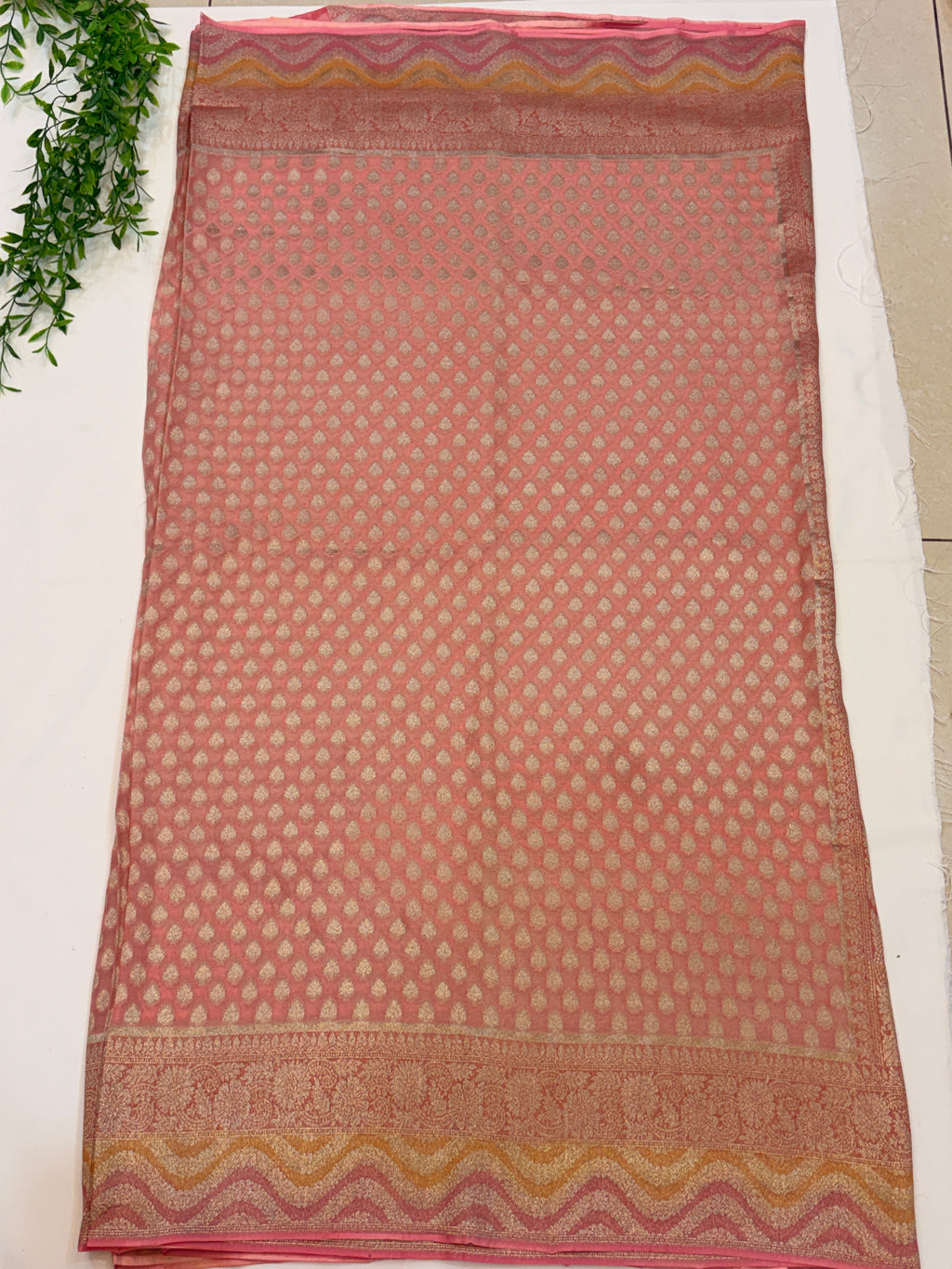 Peach Pink Khaddi Georgette Saree with Silver Buttis