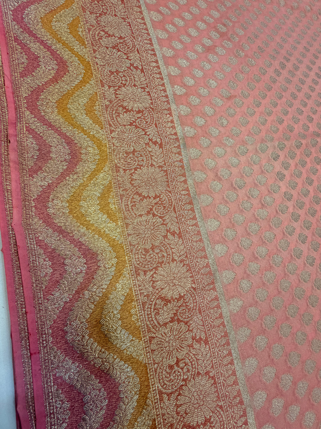 Peach Pink Khaddi Georgette Saree with Silver Buttis