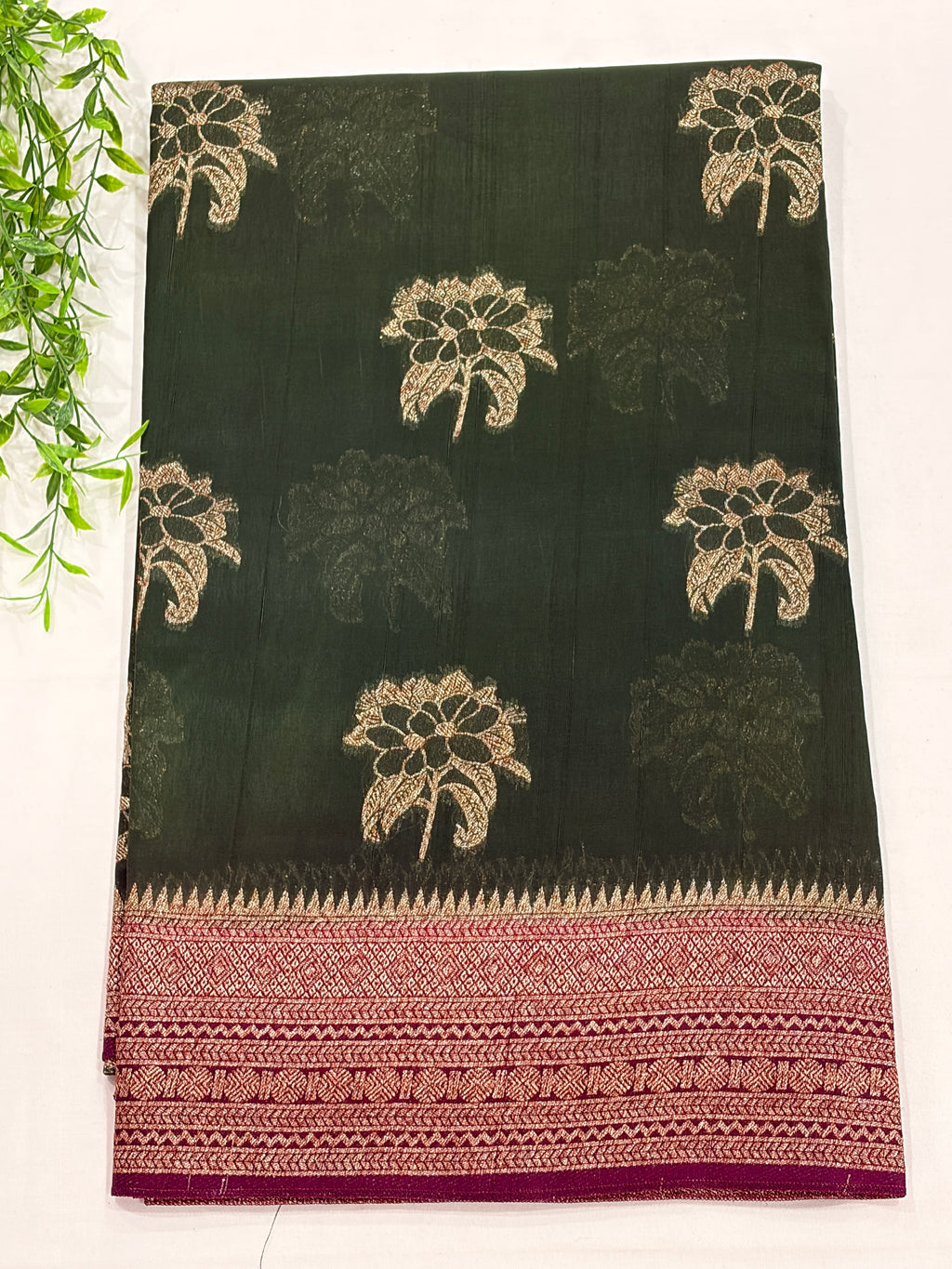 Dark Green Tussar Saree with Gold Floral Motifs